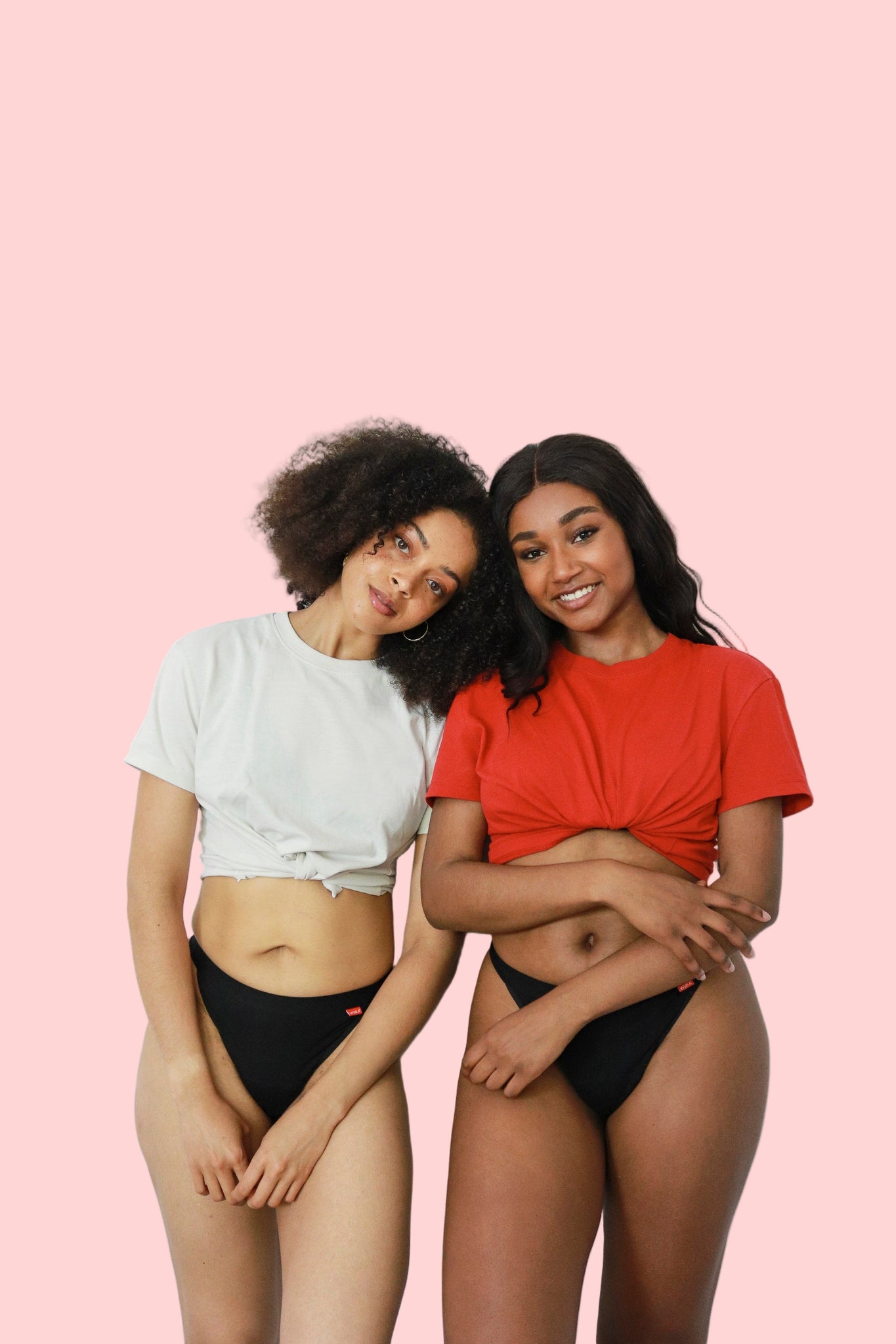 Two women with Period thongs standing with white background. תחתוני מחזור וחוטיני למחזור